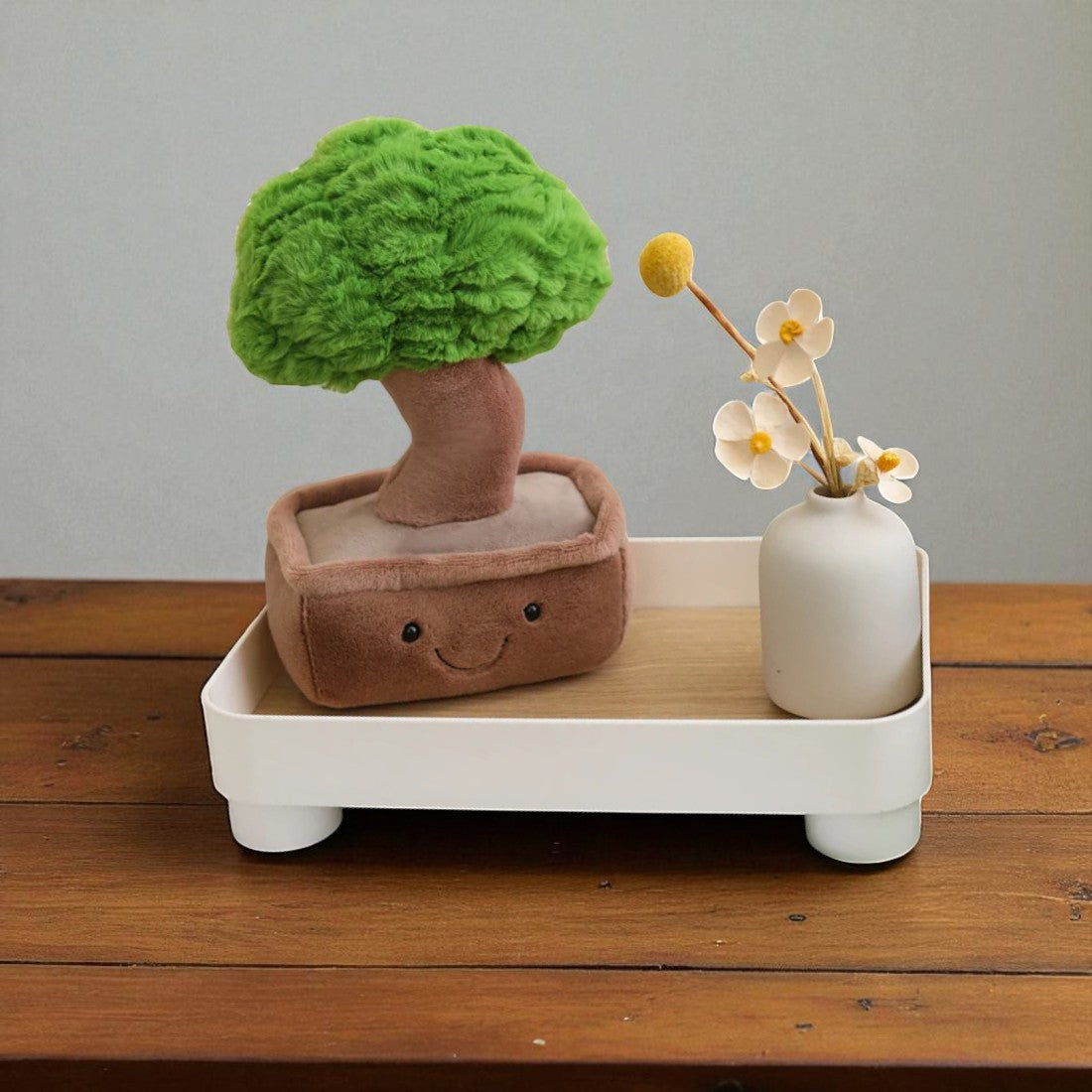 Bonsai kawaii Kuscheltier sanftes Lächeln im Topf Die Kuschelecke