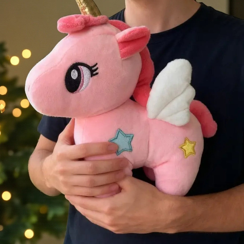 Einhorn Kuscheltier mit Sternen und magischen Flügeln Die Kuschelecke