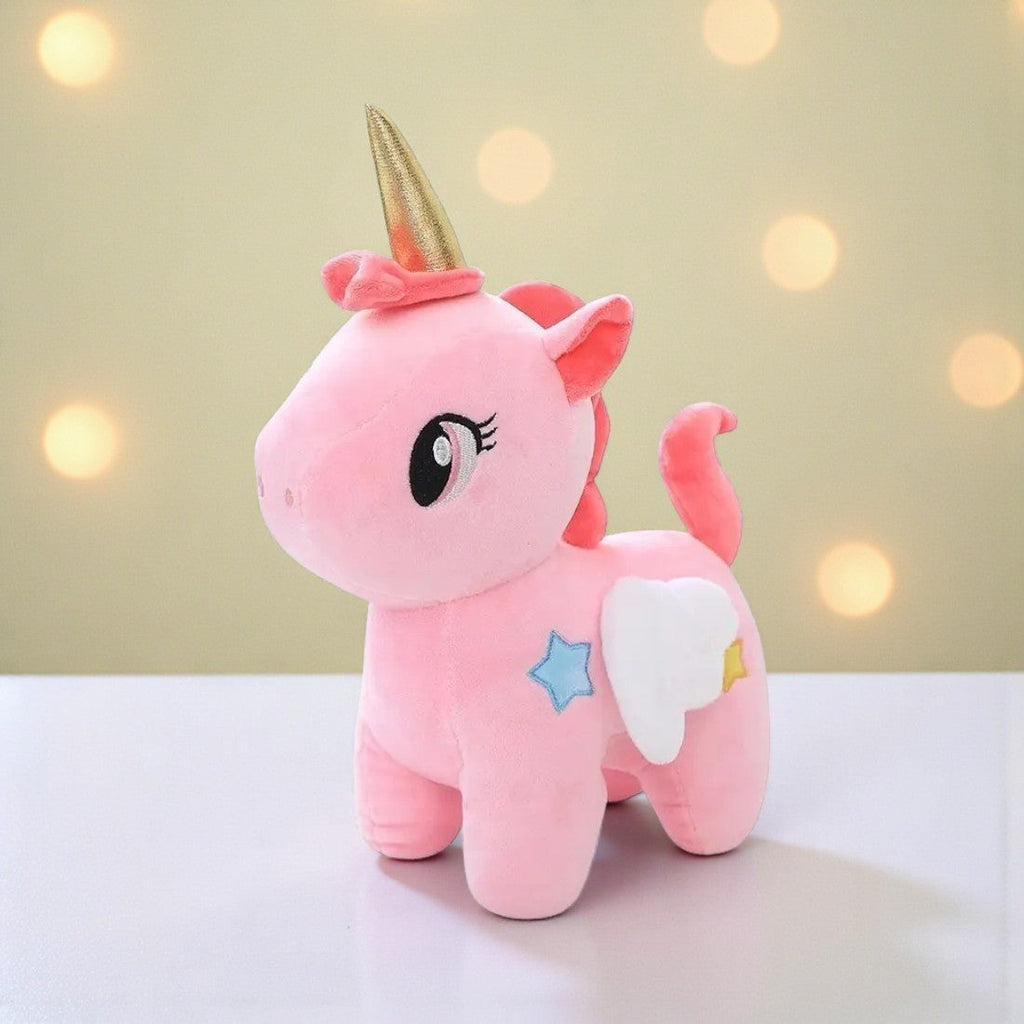 Einhorn Kuscheltier mit Sternen und magischen Flügeln Die Kuschelecke