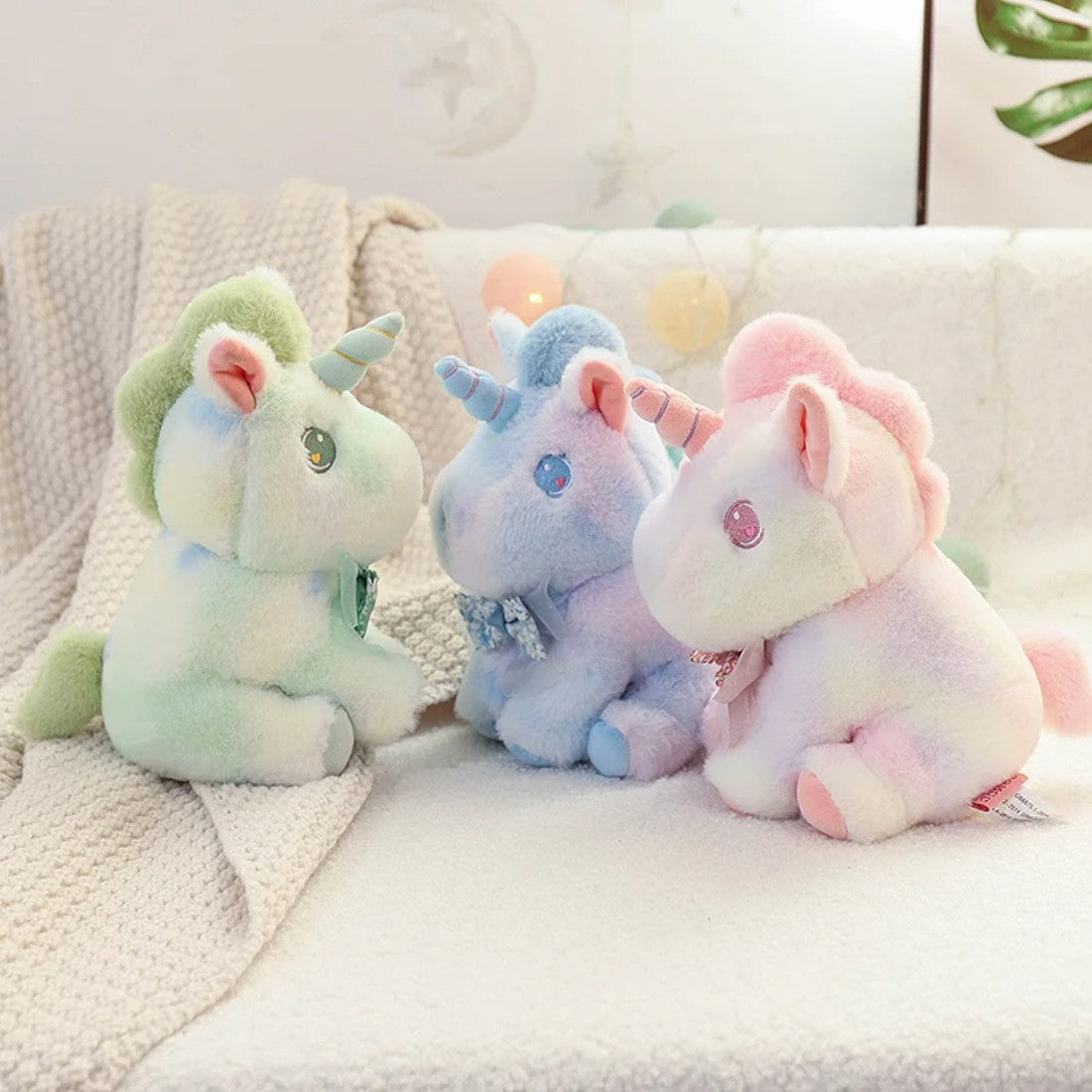 Pastell Einhorn Kuscheltier für Kinder mit Blumenschleife Die Kuschelecke
