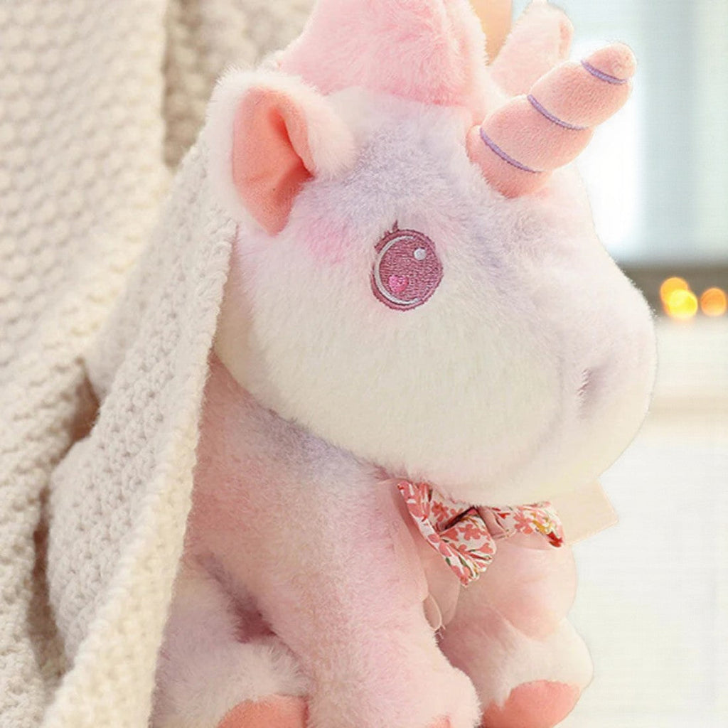 Pastell Einhorn Kuscheltier für Kinder mit Blumenschleife Die Kuschelecke